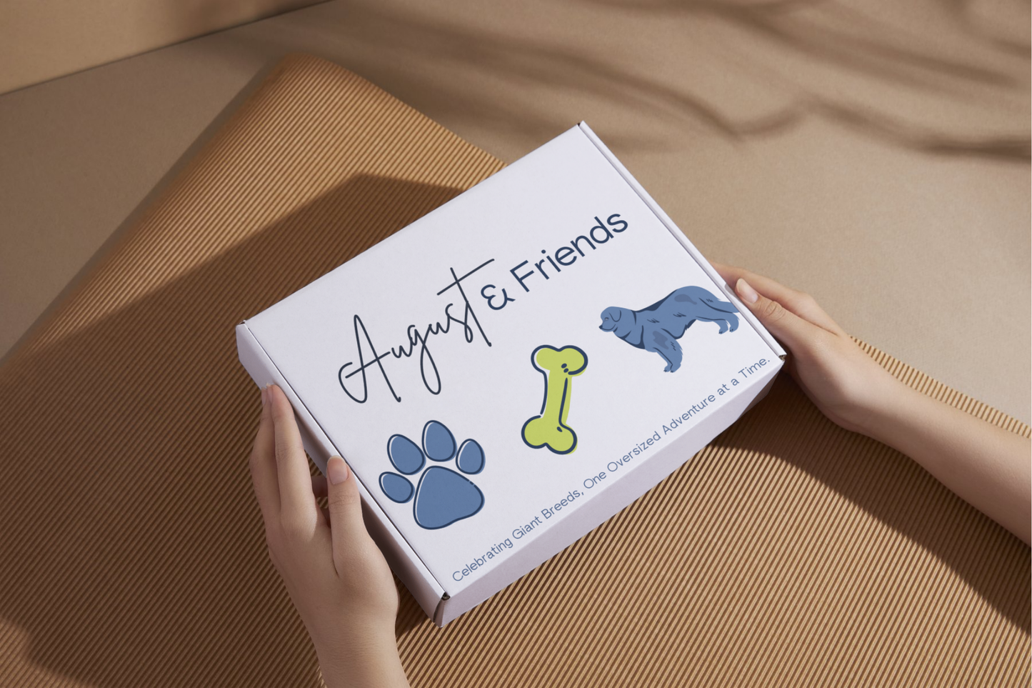 August & Friends giant breed subscription box with the brand logo on top.